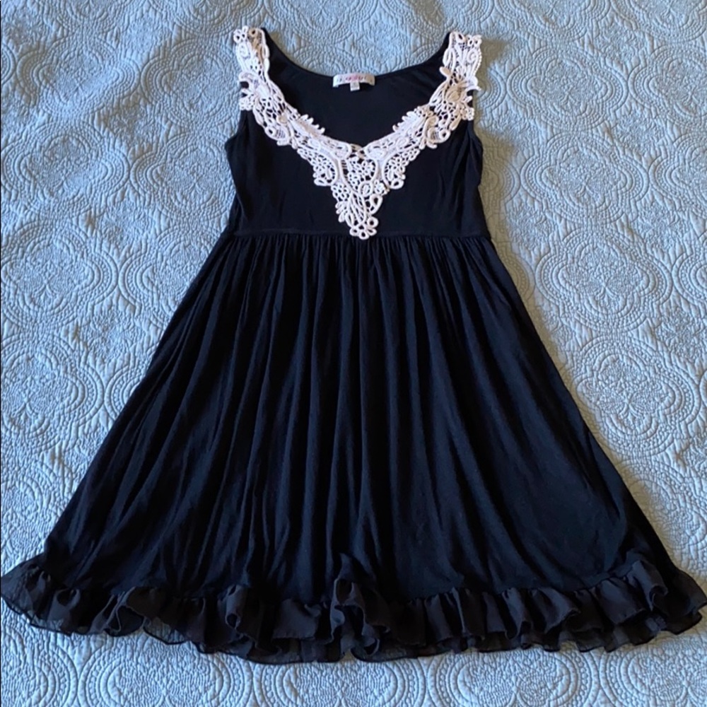 Black dress with white crochet neckline